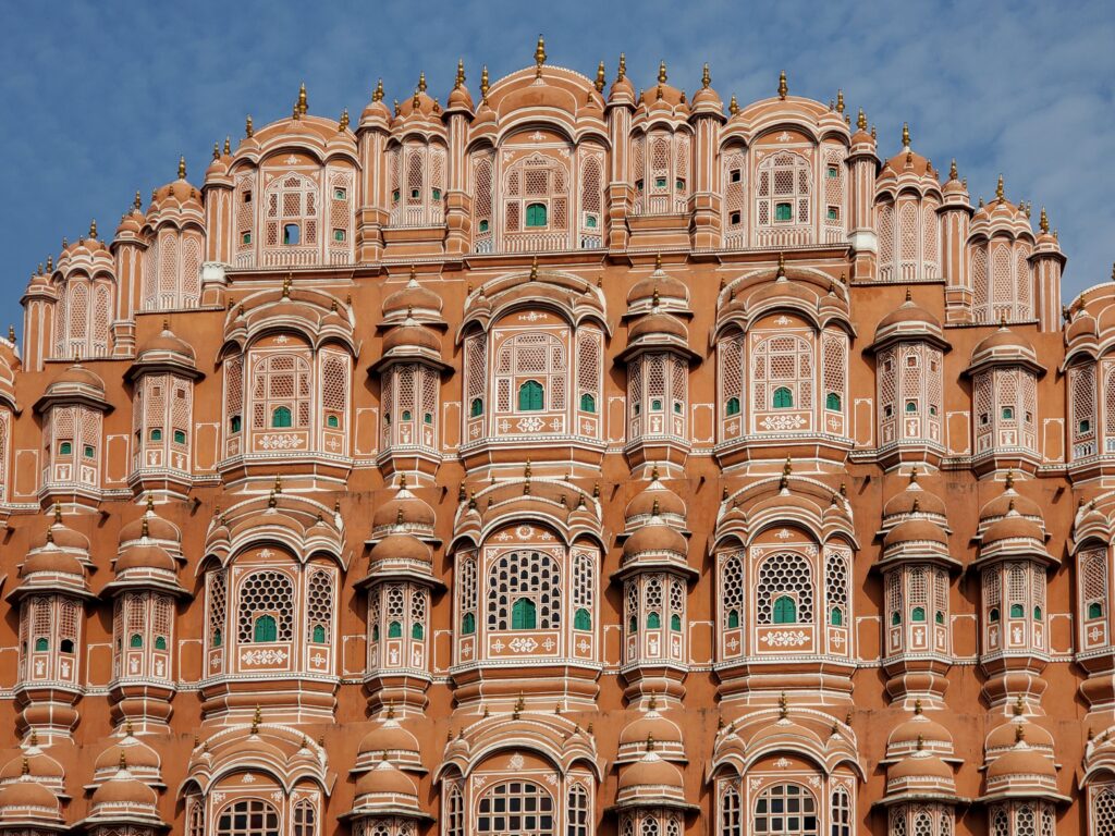 Stunning view of Hawa Mahal's intricate facade in Jaipur, showcasing Mughal architecture.